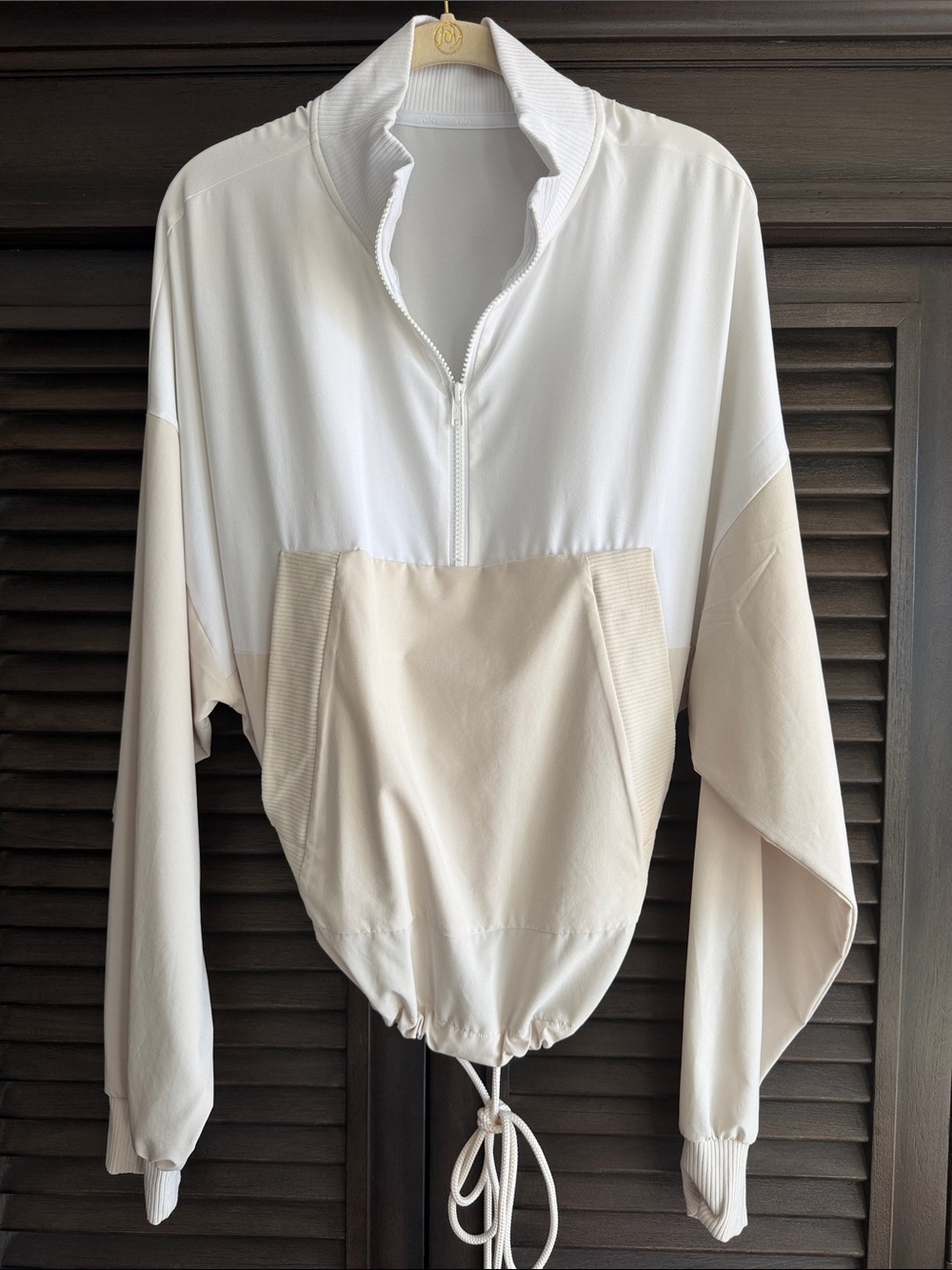 ALO Yoga Colorblock Half-Zip Drawcord Pullover in White and Beige